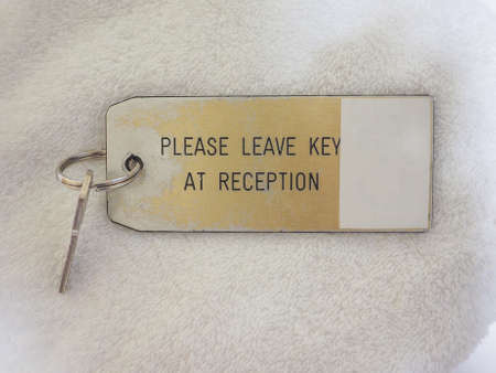 Hotel room key - Please leave key at receptionの写真素材