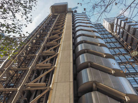 LONDON, UK - SEPTEMBER 29, 2015: Lloyd of London is an iconic high tech skyscraper designed by...