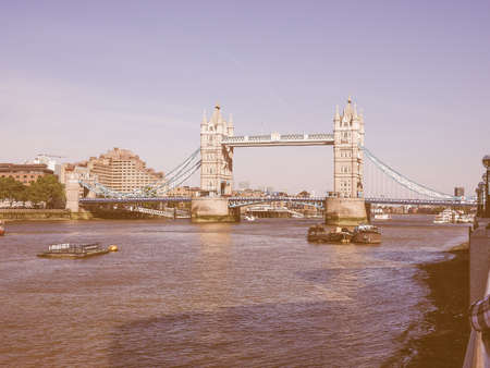 Vintage looking Tower Bridge on River Thames in London, UKの写真素材