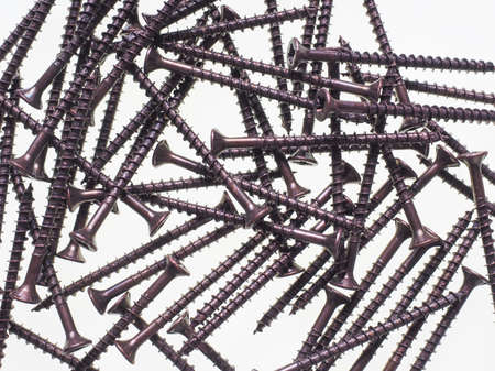 Many bronze screws for woodの写真素材