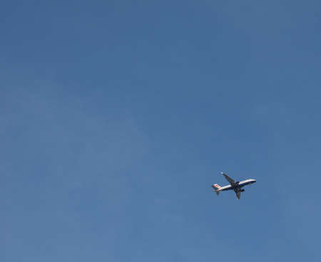 LONDON, UK - SEPTEMBER 29, 2015: BA British Airways plane with blue sky copy space