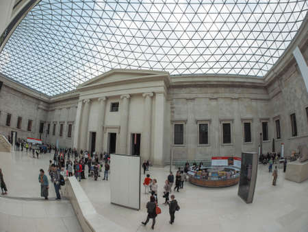 LONDON, UK - SEPTEMBER 28, 2015: Tourists in the Great Court at the British Museum designed by architect Lord Norman Foster opened in year 2000 seen with fisheye lensのeditorial素材