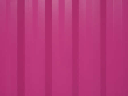 Pink corrugated steel texture useful as a backgroundの写真素材