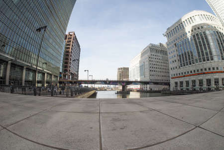 LONDON, UK - SEPTEMBER 29, 2015: The Canary Wharf business centre is the largest business district in the United Kingdom isolated over white backgroundのeditorial素材