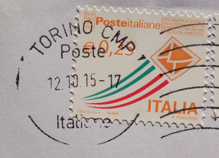 TURIN, ITALY - OCTOBER 22, 2015: A stamp printed by Italy shows a letter envelope with an Italian...