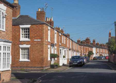 STRATFORD UPON AVON, UK - SEPTEMBER 26, 2015: A row of typically British terraced houses aka...