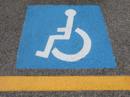 Disabled parking sign in reserved parking lotの写真素材
