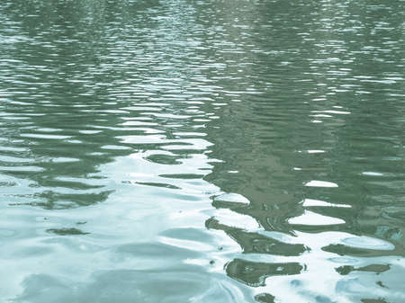 Blue water texture useful as a background - cool cold toneの写真素材