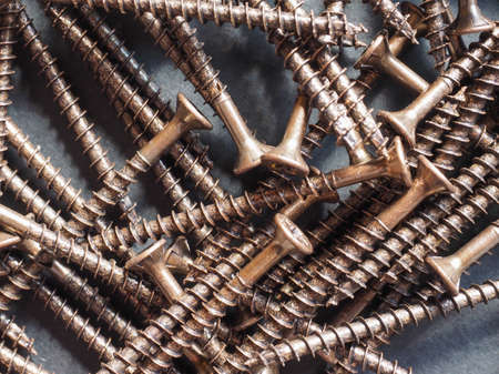 Many bronze screws for wood