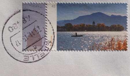 BERLIN, GERMANY - NOVEMBER 27, 2015: A stamp printed by Germany shows Chiemsee lake in Bavariaのeditorial素材