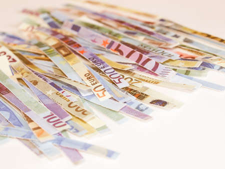 Money to burn - banknotes cut with a paper shredder vintage