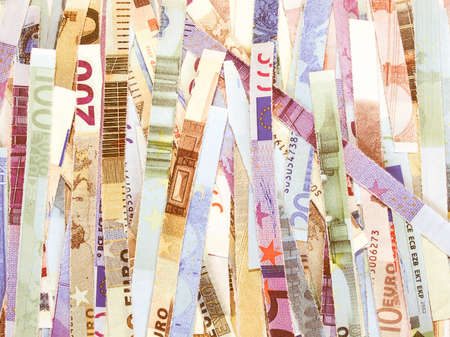 Money to burn - banknotes cut with a paper shredder vintage