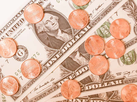 One cent coins and One Dollar banknotes  currency of the United States useful as a background...