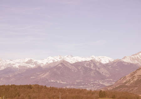Vintage looking View of Alps mountains in Piedmont, Italy