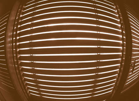 Sun light daylight passing through window blinds in black and white vintage