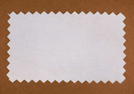 Blue paper swatch with zig zag border cut with pinking shears vintage