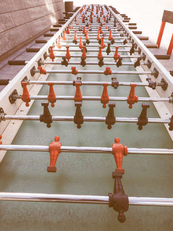 Table football aka table soccer, foosball from the German Tischfussball, baby-foot or kicker...