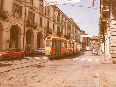 TURIN, ITALY - APRIL 09, 2014: Tram in Via Po ancient central baroque street vintageのeditorial素材