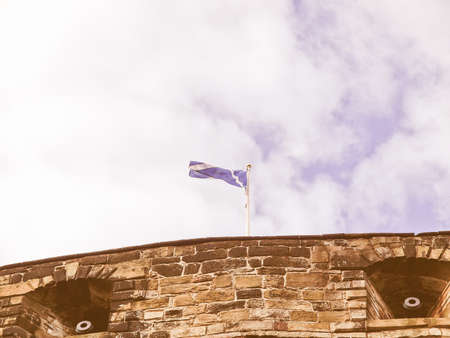 Flag of Scotland on the Edinburgh Castle vintageのeditorial素材