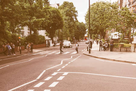 LONDON, UK - JUNE 10, 2015: Abbey Road zebra crossing made famous by the 1969 Beatles album cover vintageのeditorial素材