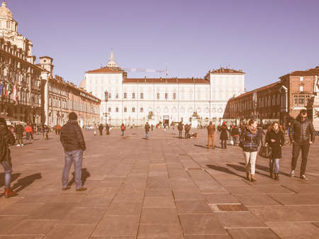 TURIN, ITALY - JANUARY 24, 2014: Tourists visiting Piazza Castello, the central baroque square vintageのeditorial素材