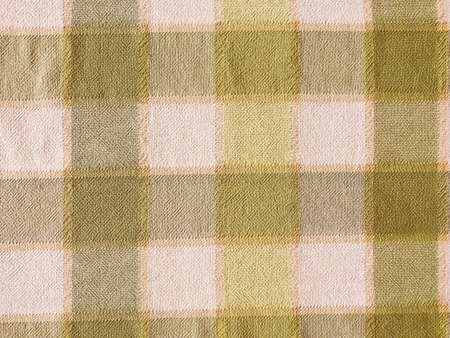 Vintage looking Tablecloth texture useful as a backgroundの写真素材