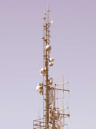 Communication tower radio mast with antenna aerial vintageの写真素材