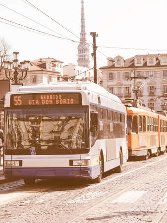 A bus and tramway in Piazza Castello, Turin, Italy vintageの写真素材