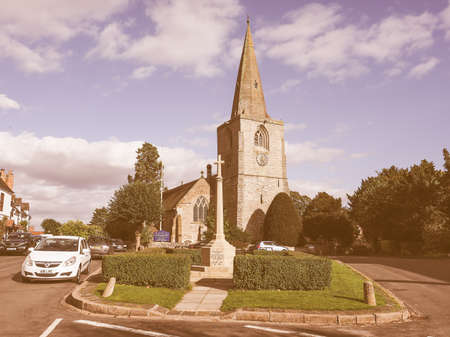 TANWORTH IN ARDEN, UK - SEPTEMBER 25, 2015: The Village Green with St Mary Magdalene church vintageのeditorial素材