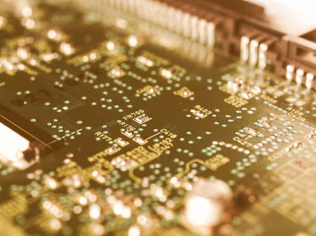 Detail of an electronic printed circuit board - selective focus vintageの写真素材