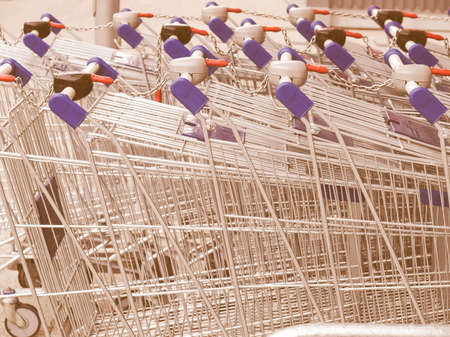 Row of supermarket shopping carts or trolleys vintageの写真素材