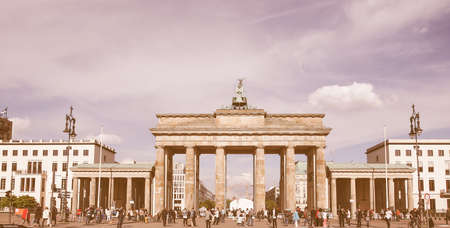 BERLIN, GERMANY - MAY 09, 2014: Tourists visiting the Brandenburger Tor (Brandenburg Gate) linking East and West Berlin vintageのeditorial素材