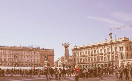 MILAN, ITALY - MARCH 28, 2015: Tourists in the Piazza Duomo square in front of Milan Cathedral church vintageのeditorial素材