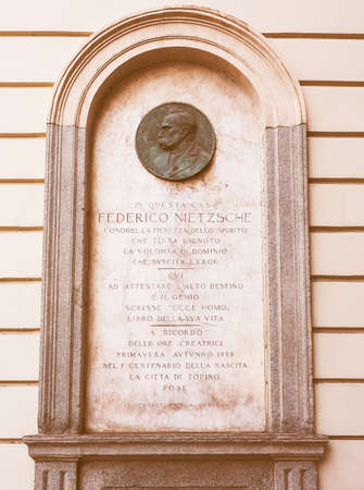 TURIN, ITALY - AUGUST 05, 2015: Commemorative plaque for Friedrich Nietzsche at his house vintageのeditorial素材