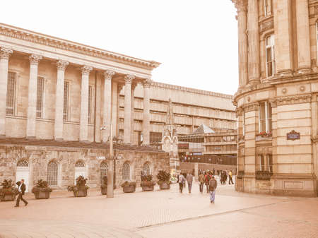BIRMINGHAM, UK - SEPTEMBER 24, 2015: Tourists visiting the city vintageのeditorial素材