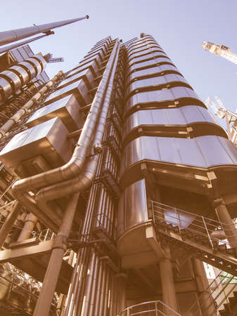LONDON, ENGLAND, UK - SEPTEMBER 07, 2012: Iconic high tech skyscraper designed by architect Richard Rogers in 1986 for the Lloyds of London and now Grade I listed vintageのeditorial素材