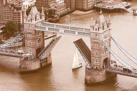 LONDON, UK - JUNE 10, 2015: Aerial view of Tower Bridge over River Thames vintageのeditorial素材