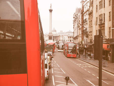LONDON, UK - JUNE 12, 2015: Red double decker buses are a traditional landmark of London vintageのeditorial素材