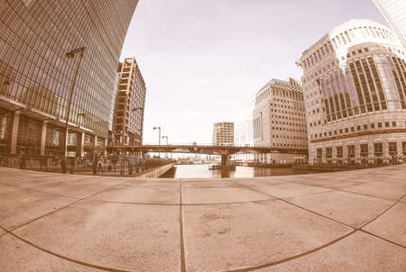 LONDON, UK - SEPTEMBER 29, 2015: The Canary Wharf business centre is the largest business district in the United Kingdom isolated over white background vintageのeditorial素材