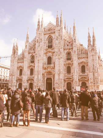 MILAN, ITALY - FEBRUARY 23, 2014: People attending mass in front of Milan cathedral celebrated by Filipino Cardinal Luis Antonio Tagle Archbishop of Manila and Antonio Scola Archibishop of Milan vintageのeditorial素材