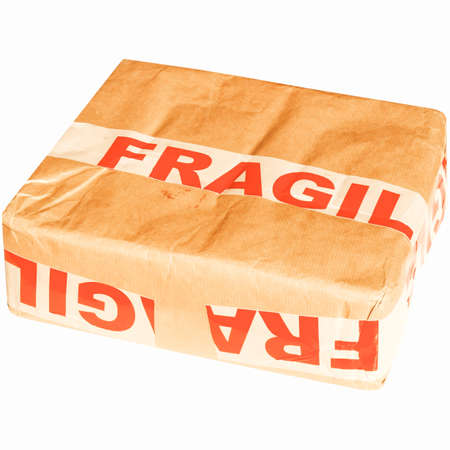 Fragile corrugated cardboard packet isolated on white vintageの写真素材