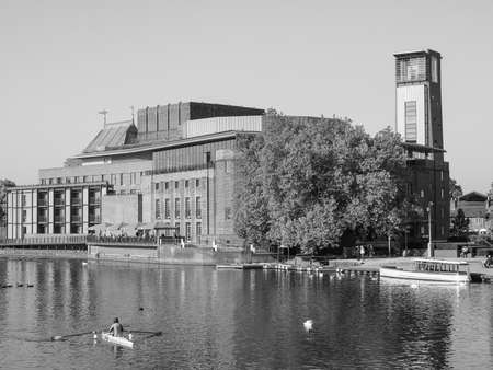 STRATFORD UPON AVON, UK - SEPTEMBER 26, 2015: Royal Shakespeare Theatre on River Avon in Shakespeare birth town in black and whiteのeditorial素材