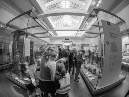 LONDON, UK - SEPTEMBER 28, 2015: Tourists visiting the British Museum in black and whiteのeditorial素材