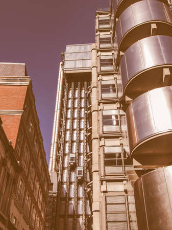 LONDON, ENGLAND, UK - SEPTEMBER 07, 2012: Iconic high tech skyscraper designed by architect Richard Rogers in 1986 for the Lloyds of London and now Grade I listed vintageのeditorial素材
