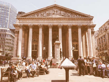 LONDON, UK - JUNE 11, 2015: People in front of The Royal Stock Exchange vintageのeditorial素材