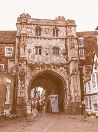 CANTERBURY, UK - SEPTEMBER 11, 2012: Tourists queueing under the Saint Augustine Gate in order to visit Canterbury Cathedral vintageのeditorial素材