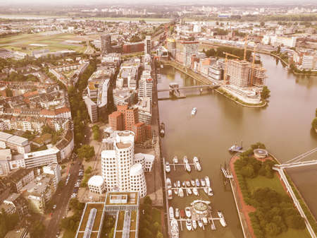 DUESSELDORF, GERMANY - AUGUST 3, 2009: The new Medienafen is a redevelopment area in the former docklands and harbour with buildings designed by Steven Holl, David Chipperfield and Frank O Gehry vintageのeditorial素材