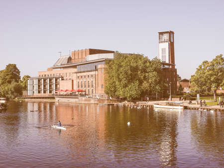 STRATFORD UPON AVON, UK - SEPTEMBER 26, 2015: Royal Shakespeare Theatre on River Avon in Shakespeare birth town vintageのeditorial素材