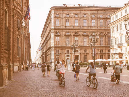 TURIN, ITALY - JULY 07, 2015: Tourists in Piazza Carignano square vintageのeditorial素材