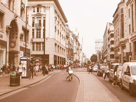 LONDON, UK - JUNE 12, 2015: Tourists in busy central London street vintageのeditorial素材